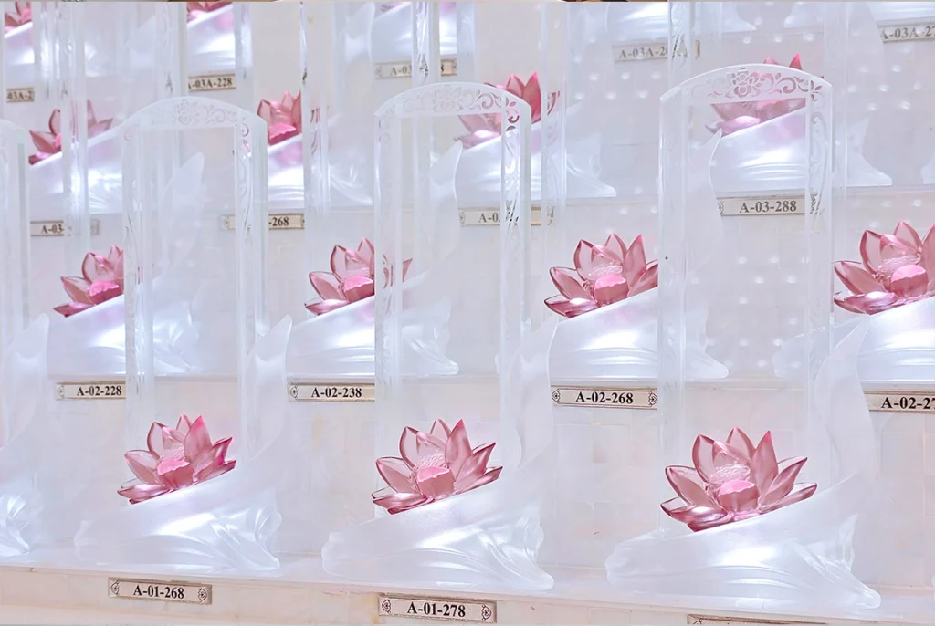Crystal pedestal with purple lotus flower design